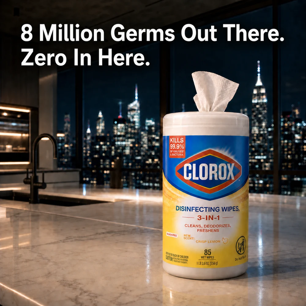 A finished Instagram ad: the same Clorox canister on a marble counter in a darkened Manhattan penthouse with the city skyline behind it, headlined 8 Million Germs Out There. Zero In Here.